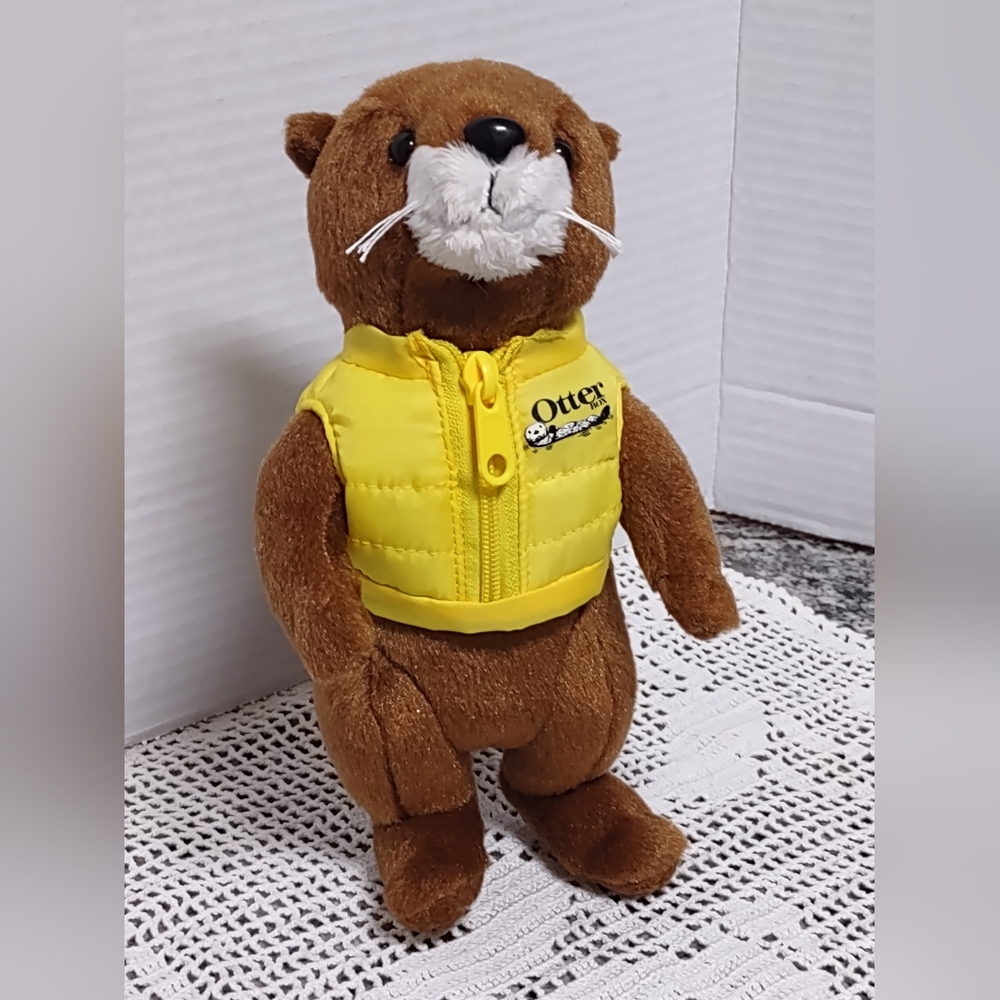 otter Box Plush Toy with Yellow Vest